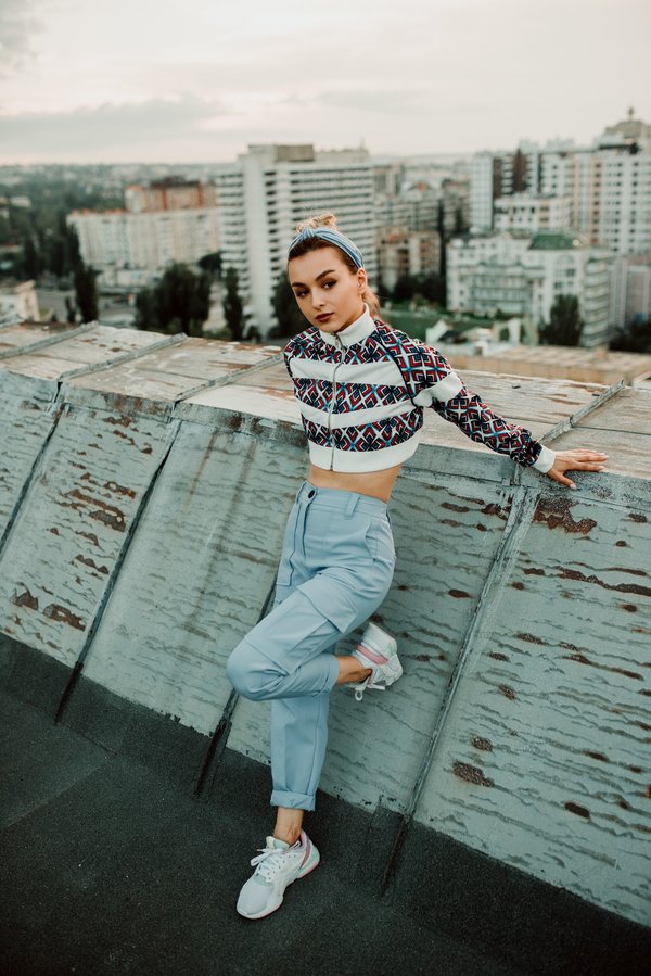 What are the practical considerations for creating noise barriers in urban living environments?